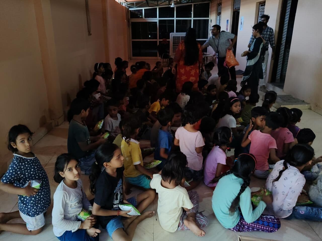Families gathered indoors for a foundation-run session