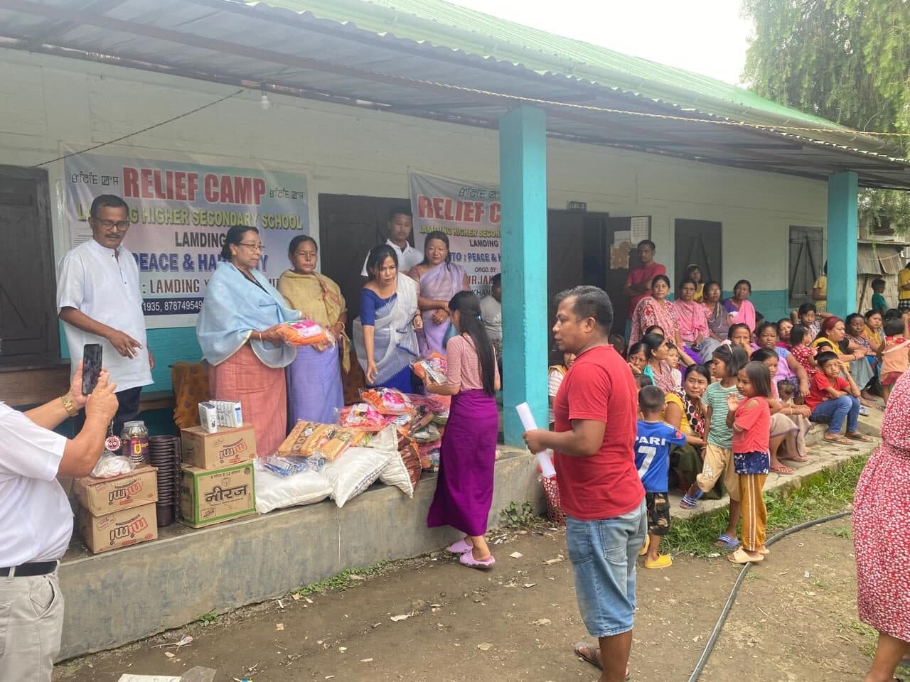 Relief kits being handed to displaced families at a camp in Manipur